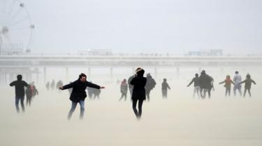 People on the beach at Scheveningen, the Netherlands, during Storm Ciara, 9 February 2020