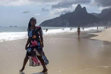 Isabel Antonio, a 16-year-old singer and refugee from the Democratic Republic of Congo, poses for a portrait at Ipanema beach in Rio de Janeiro, Brazil on December 6, 2017. She lost her country and childhood in one of Africa"s most terrible wars, but Congolese refugee Isabel Antonio has won the hearts of millions of Brazilians with her performances on The Voice Brasil.