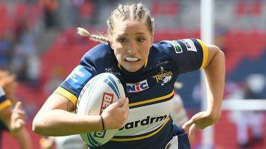 Caitlin Beevers of Leeds Rhinos runs in to score their second try of the matchduring Betfred Women's Challenge Cup Final match between St Helens and Leeds Rhinos at Wembley Stadium on August 12, 2023 in London, England