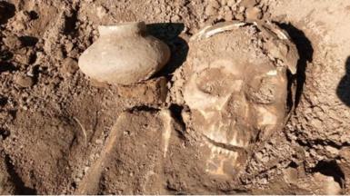 A skeleton of the earthwork building societies and pottery found at Chuchini