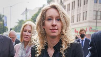 Elizabeth Holmes (C), the founder of the failed blood testing start-up company Theranos, arrives at the Robert F. Peckham Federal Building and US Courthouse for her sentencing hearing in San Jose, California, USA, 18 November 2022