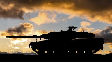 The silhouette of a Leopard tank