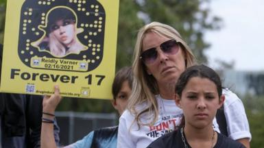 Woman and child protesting