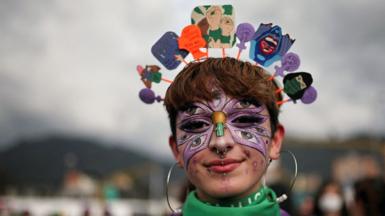 A woman participates in a rally during International Wome's Day celebrations in Bogota, Colombia, on 8 March 2022