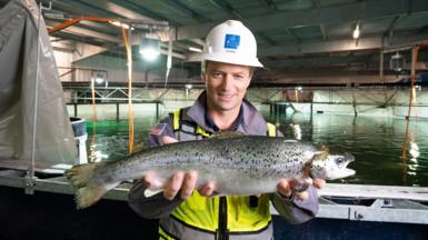 Johan Andreassen holding a salmon