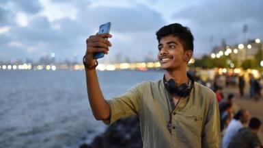 Indian man with mobile phone