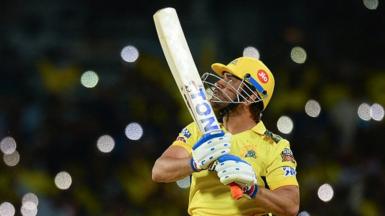 Chennai Super Kings' captain Mahendra Singh Dhoni watches the ball after playing a shot during the Indian Premier League (IPL) Twenty20 cricket match between Chennai Super Kings and Lucknow Super Giants at the MA Chidambaram Stadium in Chennai on April 3, 2023. (