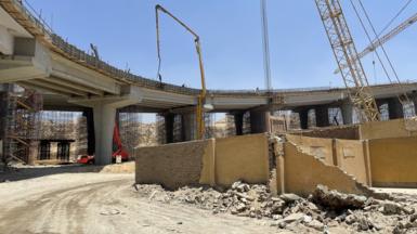 Demolished tombs next to a flyover being built in Historic Cairo