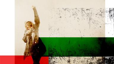 Woman with first in the air