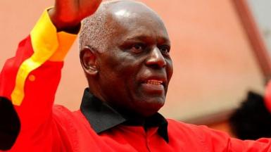 Angolan President Jose Eduardo dos Santos Angolan greets the crowd on August 29, 2012 during the final election campaign rally in Kilamba Kaixi on the outskirts of Luanda