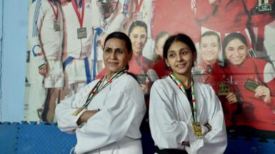 The unlikely duo train together and even won medals at an international competition recently.