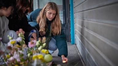 Parisians light candles in memory of the victims of the 13 November 2015 Paris terror attacks at La Belle Equipe restaurant, one of the scenes of the attacks, France, 2021