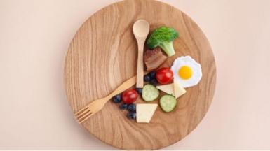 Food and cutlery on a plate