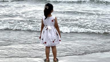 Girl on a beach in Iran