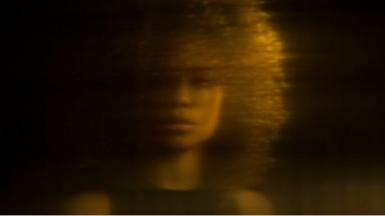 Blurred image of a woman