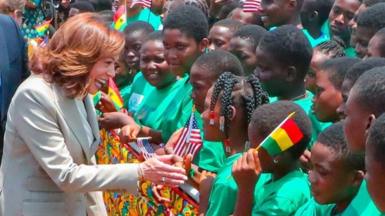 US Vice President Kamala Harris (C-L) is welcomed by Ghanian Vice President Mahamudu Bawumia (not seen) in Accra, Ghana on March 26, 2023.