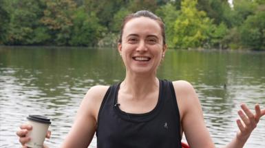 A woman talking to the camera