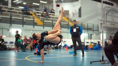 Woman athlete in Alaskan high kick