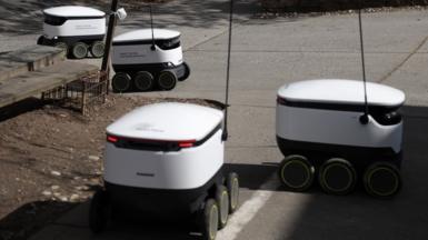 Starship Technologies delivery robots are seen in front of the Broad Branch Market April 8, 2020 in the Chevy Chase neighborhood of Washington, DC