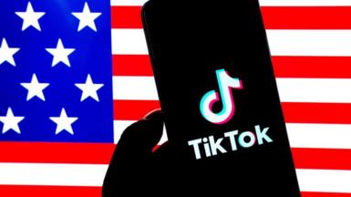 TikTok logo on smartphone