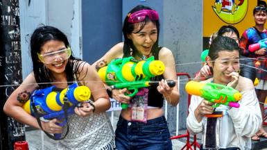 People celebrate the Songkran holiday in Bangkok, Thailand, marking the Thai New Year on 13 April 2023