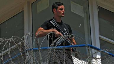 A police officer keeps watch from an observation tower at the Gilboa Prison in northern Israel