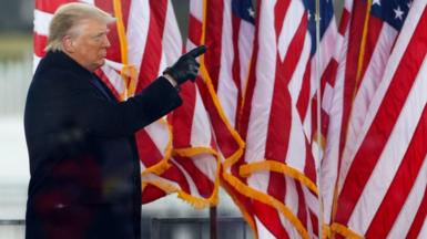 President Donald Trump greets the crowd at the "Stop The Steal" Rally