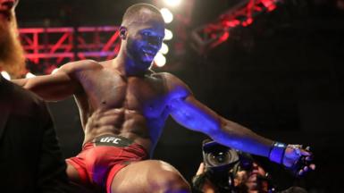 Leon Edwards sticks his tongue out in celebration