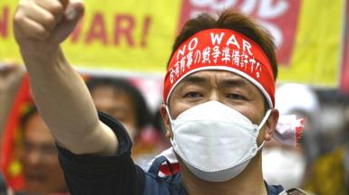Japanese man protesting against the G7 summit held in Hiroshima from May 19 to 21, 2023