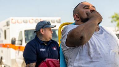 Man being treated for heat-related illness in Eagle Pass on 29 June