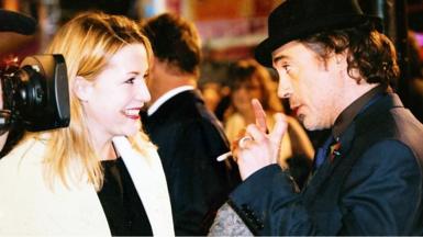 Reporter Sophie van Brugen on the red carpet with Robert Downey Jr