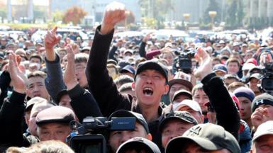 Protesters gather during a rally demanding the impeachment of Kyrgyzstan's President Sooronbay Jeenbekov in the central square of Ala-Too in Bishkek, Kyrgyzstan, 7 October 2020