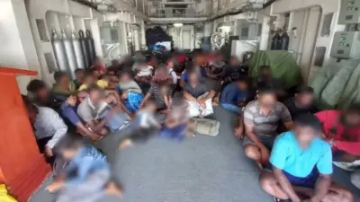 A group of people including women and children arrested by Sri Lanka Navy