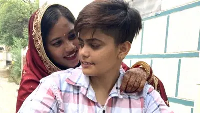 Dimple and Manisha seen on a motorbike