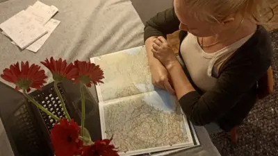 Нина купила немецкий атлас для 12-летнего сына