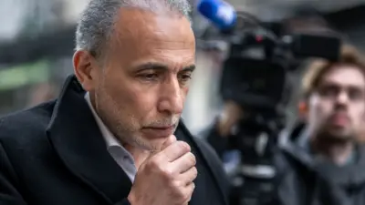 Swiss Islamic scholar Tariq Ramadan arrives for the second day of his trial at the Geneva court, 16 May 2023