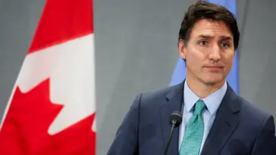 Trudeau speaks at a press conference during UNGA