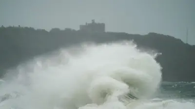 Wild seas with high waves crashing onto the coast