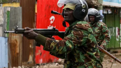 Anti-riot police officers disperse protesters and supporters of the opposition Azimio coalition as they engage with them in running battles, during the second day of renewed nationwide protests in Nairobi, Kenya, 20 July 2023.