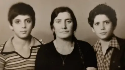 Eid Hadad, left, with mother and youngest brother in 1977