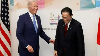 Japan PM Fumio Kishida greets US President Biden in Hiroshima