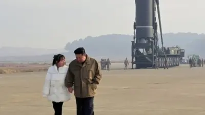 Kim Jong with his daughter