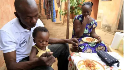 Famille qui mange