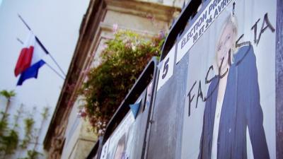 A Marine Le Pen poster defaced with the word "fascista" in France