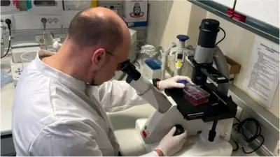 Head of the Institute of Microbiology of the German Armed Forces Roman Woelfel works in his laboraty in Munich, May 20, 2022, after Germany has detected its first case of monkeypox