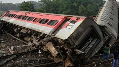 Damaged carriages are seen at the accident site of a three-train collision near Balasore, about 200 km (125 miles) from the state capital Bhubaneswar in the eastern state of Odisha, on June 3, 2023