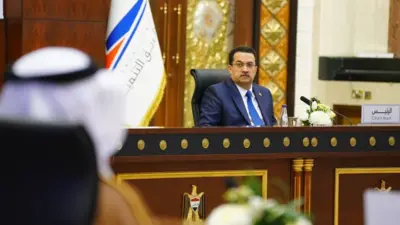رئيس الوزراء العراقي محمد شياع السوداني خلال مؤتمر "طريق التنمية" في بغداد