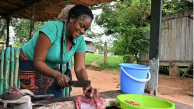 Vendeuse de viande sauvage au Congo
