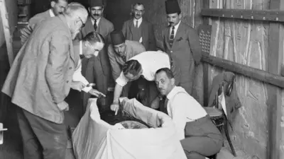 British surgeon Douglas Derry makes the first incision into Tutankhamun's mummified body