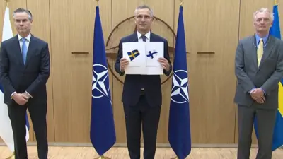 Nato Secretary General Jens Stoltenberg with Sweden's and Finland's Nato applications